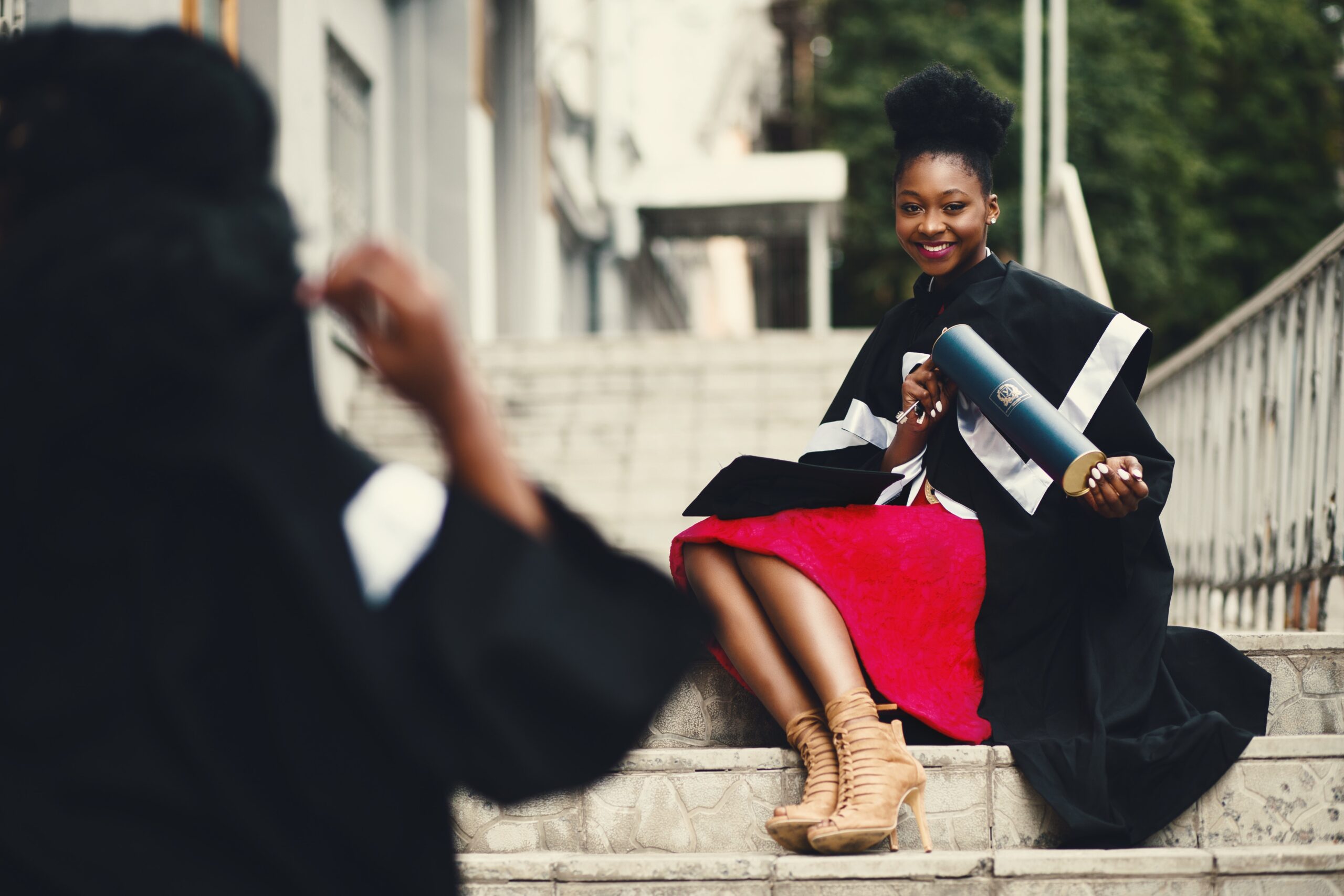 Young college graduate student on graduation day.