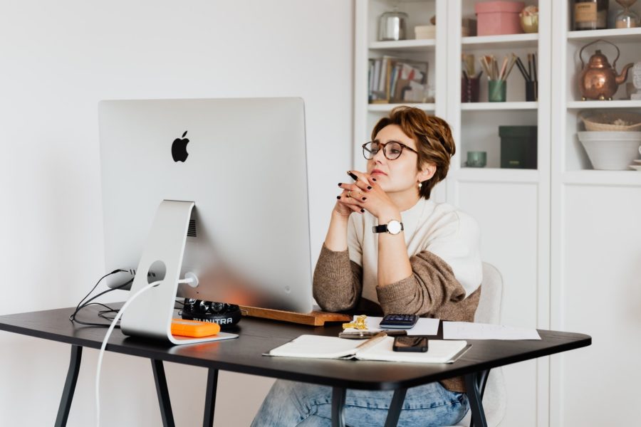 Business woman running her company from home.